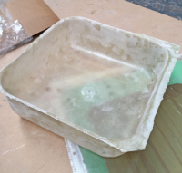The glass bowl once finally removed from the mould. The inside is baby smooth where it was laid up on the steel sink